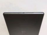 a close up of a laptop computer on a white surface