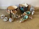 many different vases sitting on the floor next to each other
