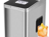 an image of a small ice maker with a glass of ice