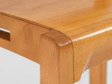 a close up of a wooden table on a white background
