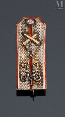an image of a metal plaque with a cross and a snake on it