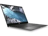 L'ordinateur portable Dell XP550 est posé sur une surface blanche, l'écran ouvert.