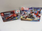 two boxes of legos are sitting on a white surface