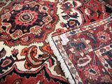 a close up of a rug with many different colors on it
