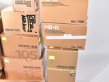 several boxes stacked on top of each other on a white surface