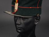 a close up of a hat on a mannequin head
