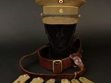 a close up of a hat on a mannequin head surrounded by dice pieces