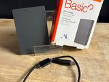 a box with a cable attached to it on a table
