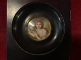 a picture of a picture of a woman on a plate
