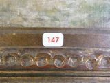 un gros plan d'un tableau sur lequel figure un numéro