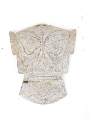 a small statue of a woman with a butterfly on her head