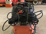 a machine that is sitting in the middle of a warehouse