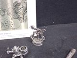 a picture of a picture of a silver object on a table
