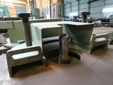 a machine that is working on a piece of metal