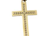gros plan d'une croix en or sur fond blanc