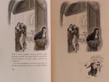 an open book with a drawing of a woman and a man