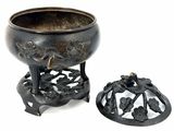an image of a bronze incense bowl with a lid on a stand