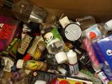 a cardboard box filled with assorted items and other items