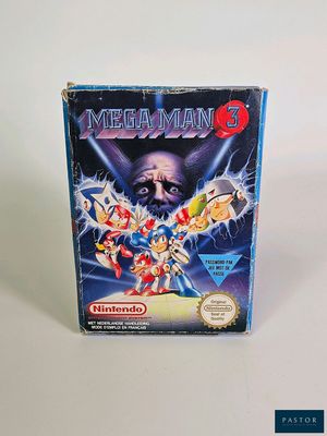 La boîte du jeu Mega Man 3 est posée sur une surface blanche.