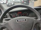 steering wheel of a car with a speedometer and gauges on it