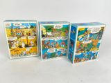 three boxes with comics on them sitting next to each other