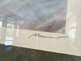 a picture of a picture on a wall above a glass table