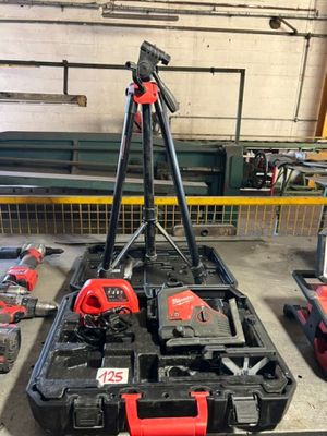 many tools that are sitting on the floor in the garage