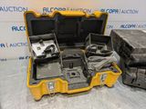 a yellow case filled with electronics on a table
