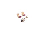 a close up of a pair of earrings on a white background