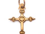 an image of a gold cross with a crown on it