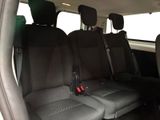 four seats in the back of a van that are empty