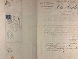 an old document with writing on it sitting on a table