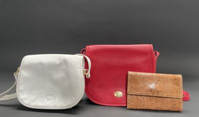 three different types of purses on a gray background
