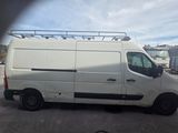 a picture of a white van parked in a parking lot