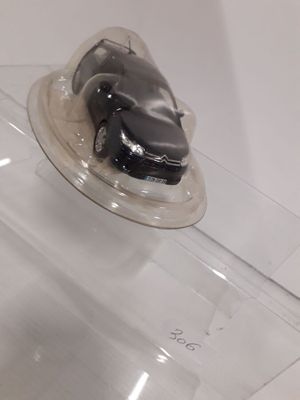 a plastic container with a piece of cake on top of it