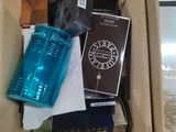 a box full of books and a cup in it