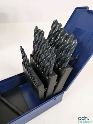 a blue box with a bunch of drill bits in it