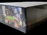 a box with a picture of a man holding a frisbee in it