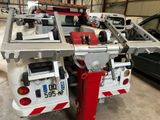 a picture of a tow truck in a garage