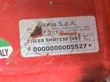 a sticker on the back of a red tractor