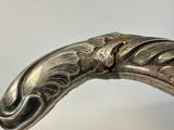 an image of a close up of a metal object on a table