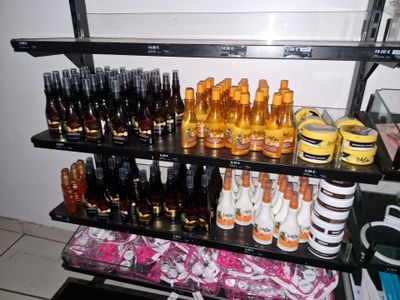 many bottles of alcohol on the shelves in the room