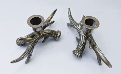 two candles that are sitting on top of each other