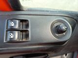 a close up of a car ' s interior with the controls on