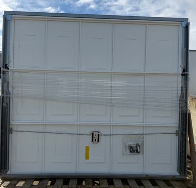 a large white box sitting on top of a pallet