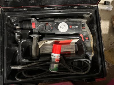 a tool in a case that is sitting on the floor