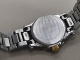 a close up of a wrist watch on a table