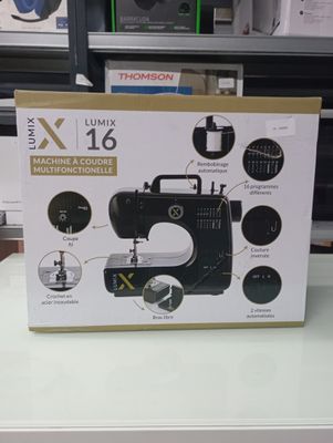 a box with a sewing machine on it on a table