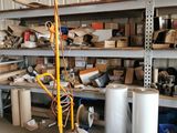 a room with a lot of items on the shelves