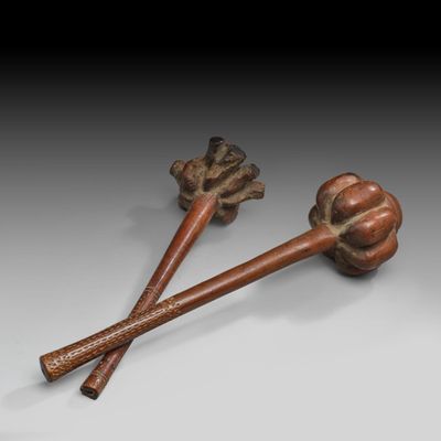 a pair of wooden chopsticks sitting on top of a table